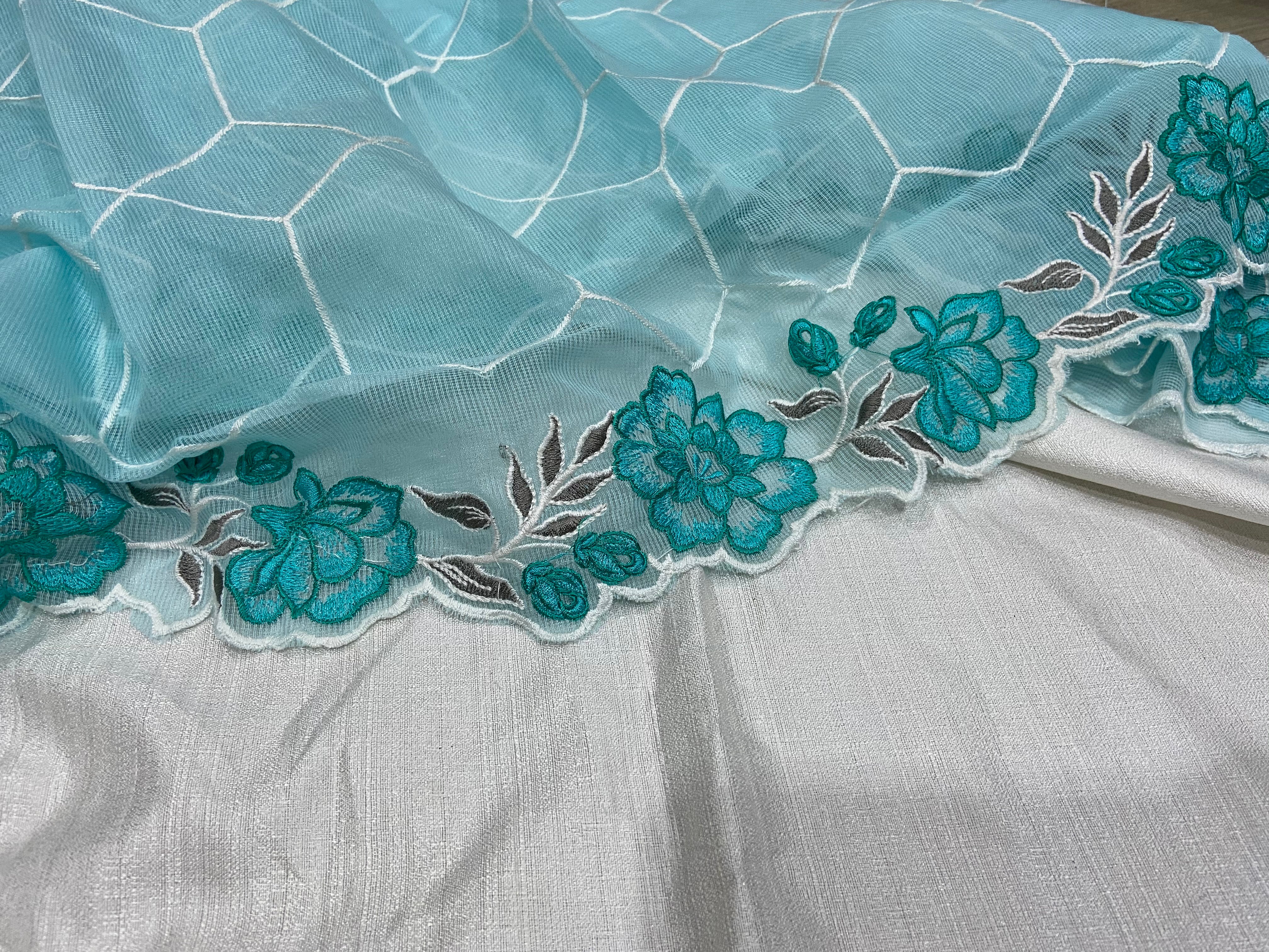 Pastel Blue Embroidered Dupatta paired with white top - Image 3